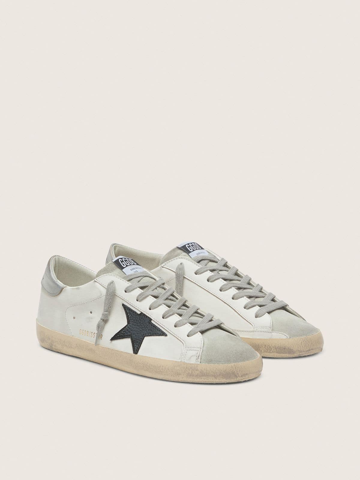 Super-Star en cuir blanc avec étoile en cuir nubuck noir et contrefort en cuir lamé argenté