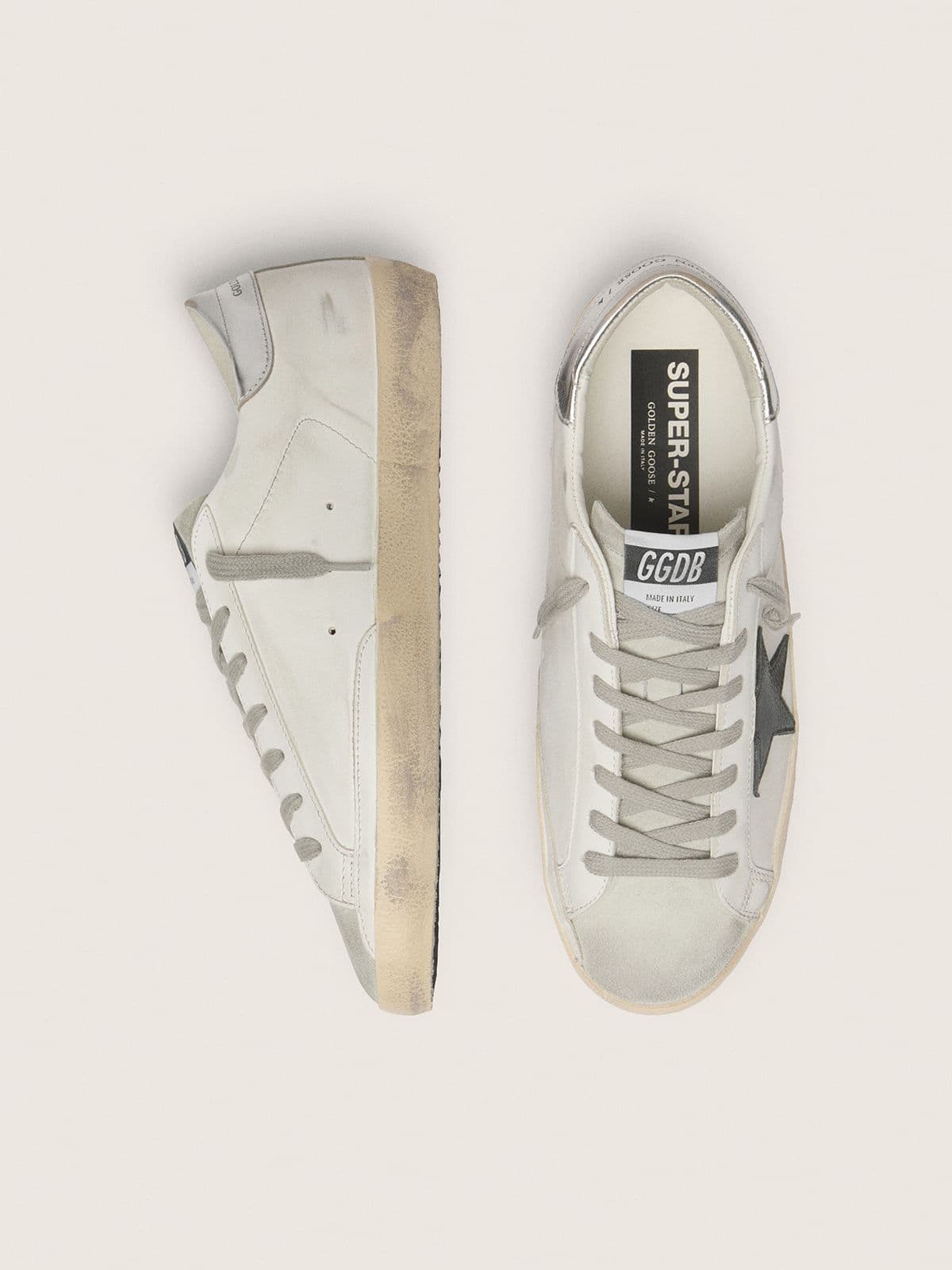 Super-Star en cuir blanc avec étoile en cuir nubuck noir et contrefort en cuir lamé argenté