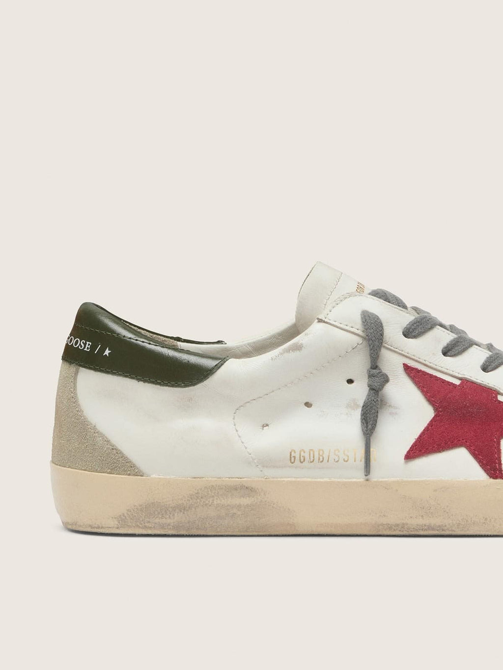 Super-Star avec étoile en daim rouge et contrefort en cuir vert