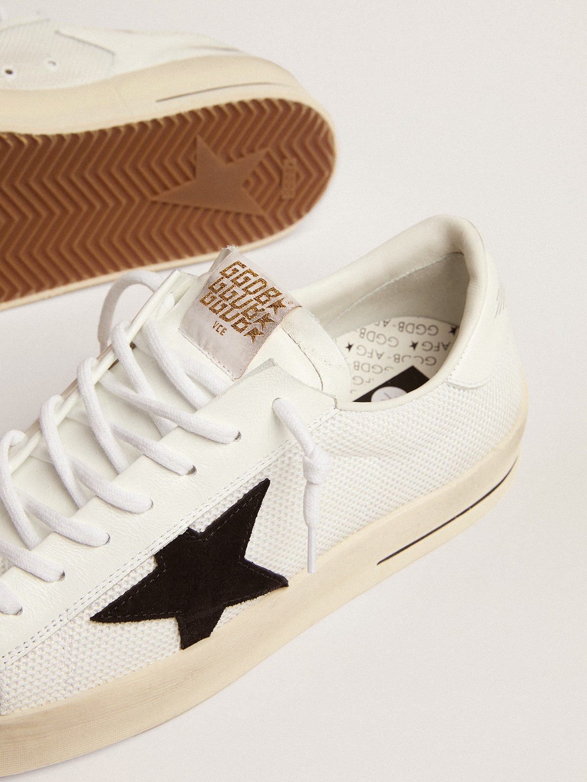Stardan homme en résille blanche avec étoile en daim noir