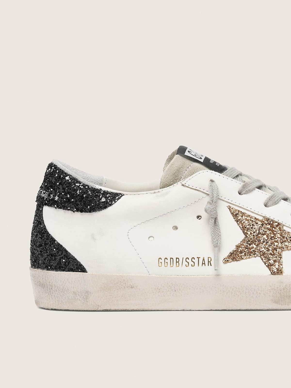 Super-Star femme en cuir nappa avec étoile à paillettes dorées et contrefort à paillettes noires