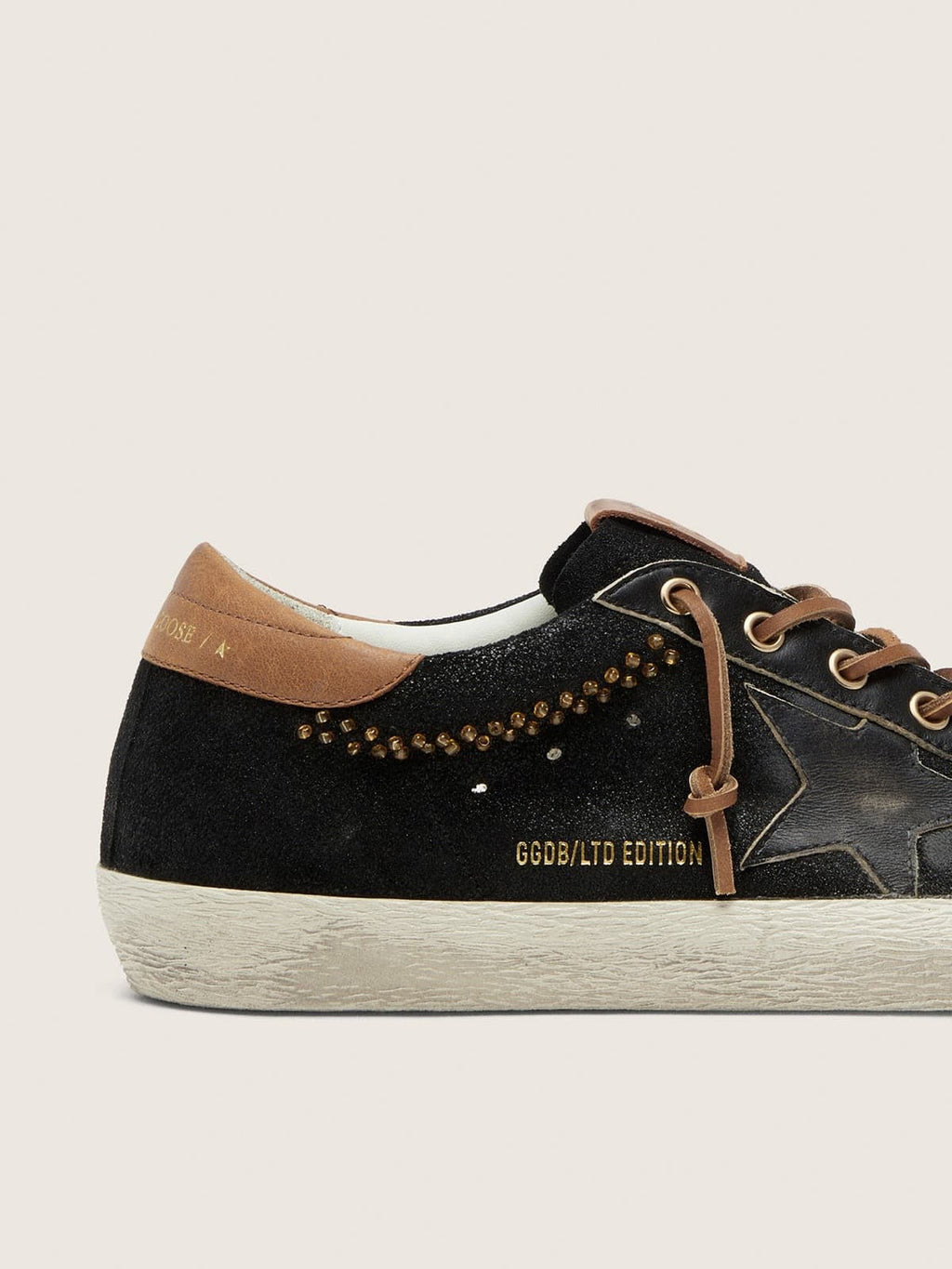 Super-Star LTD femme en cuir à paillettes noires avec étoile en cuir noir