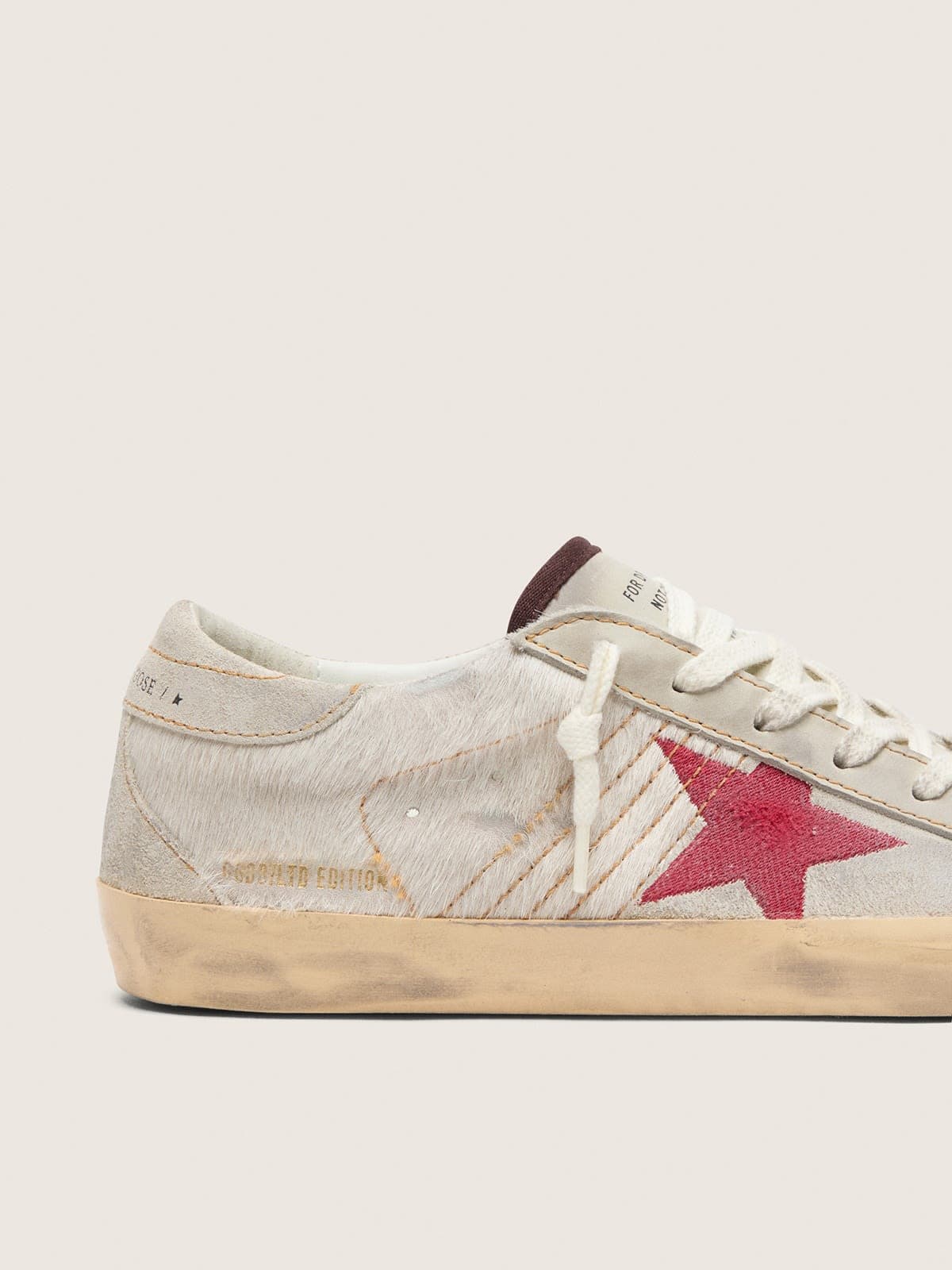 Super-Star LTD femme en cuir façon poulain blanc avec étoile en cuir velours rouge